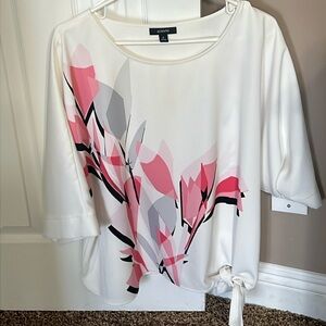 Alfani Women’s blouse with tie at the bottom.